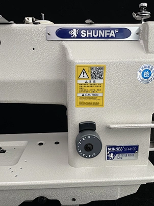 two needle lockstitch sewing machine