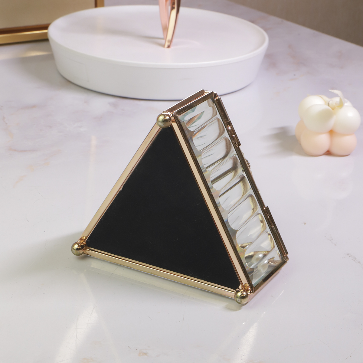 Bottom Display of Mini glass vintage jewelry ring boxes in triangular geometric shapes