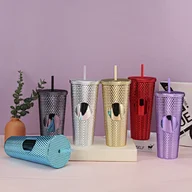 plastic cup with straw and lid