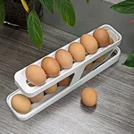 automatic rolling egg dispenser