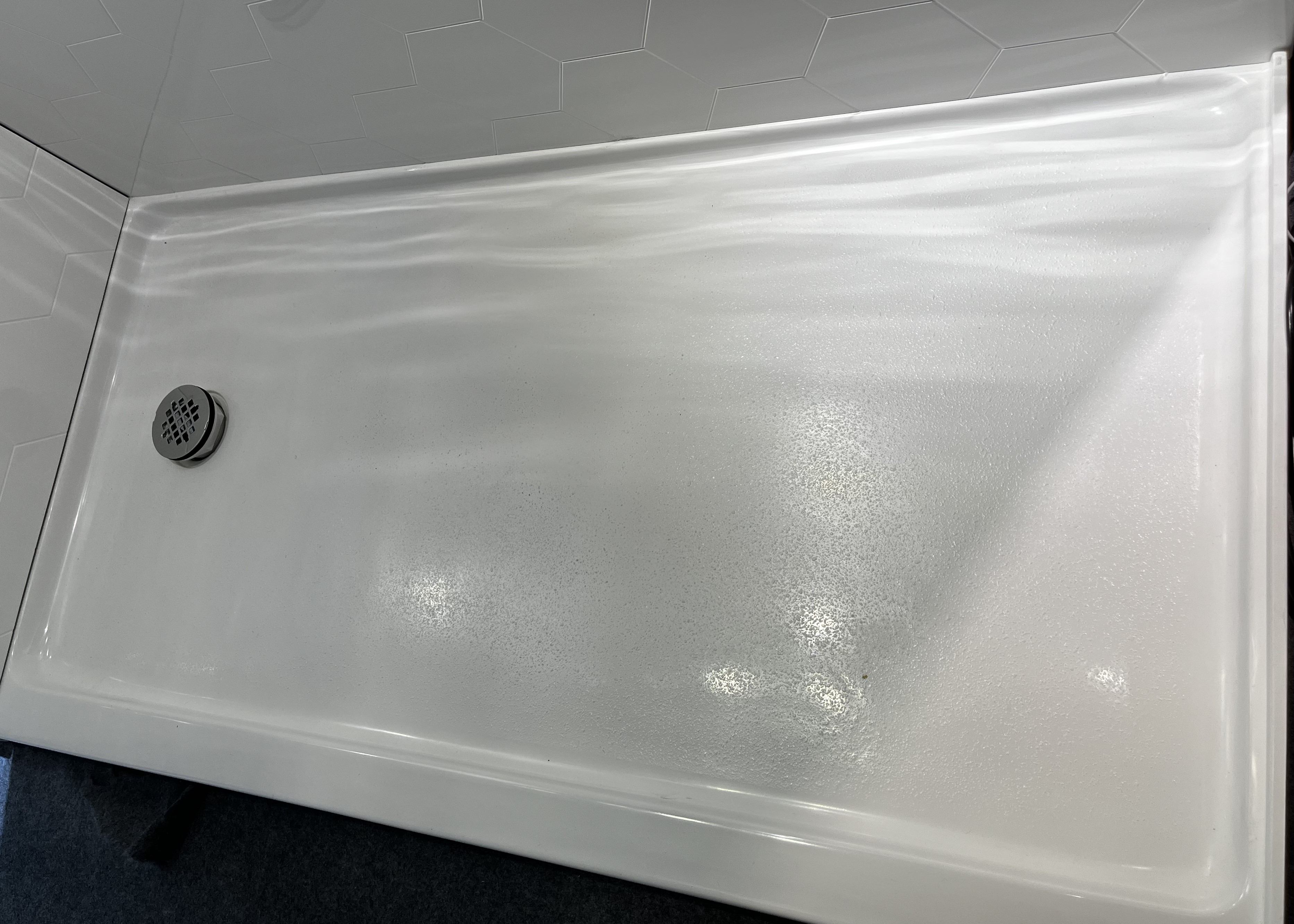 shower pan with off center drain