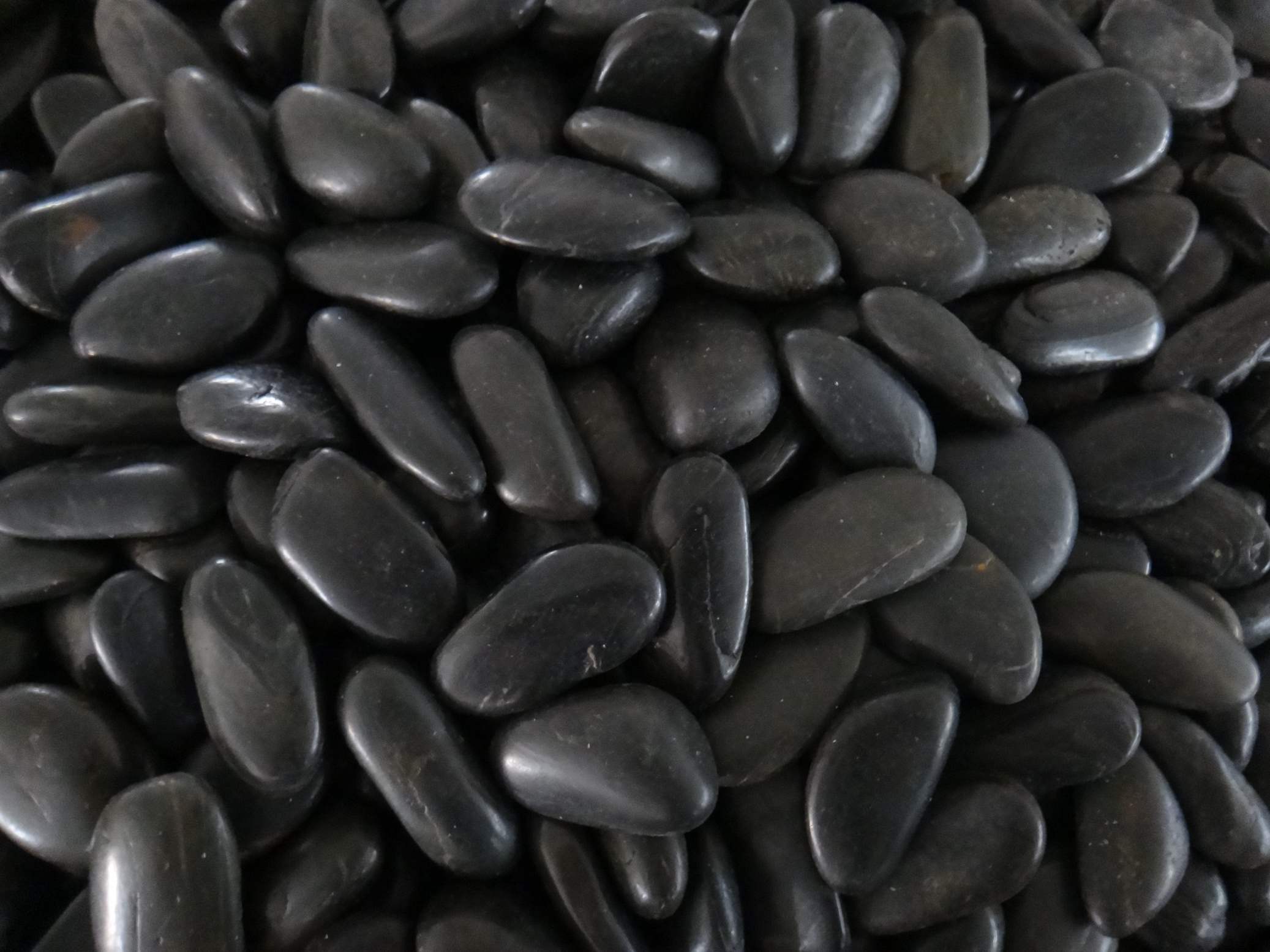 black landscape rock ,Polished black pebbles ,Black river rocks ,wholesale landscaping stones ,decorative black pebbles