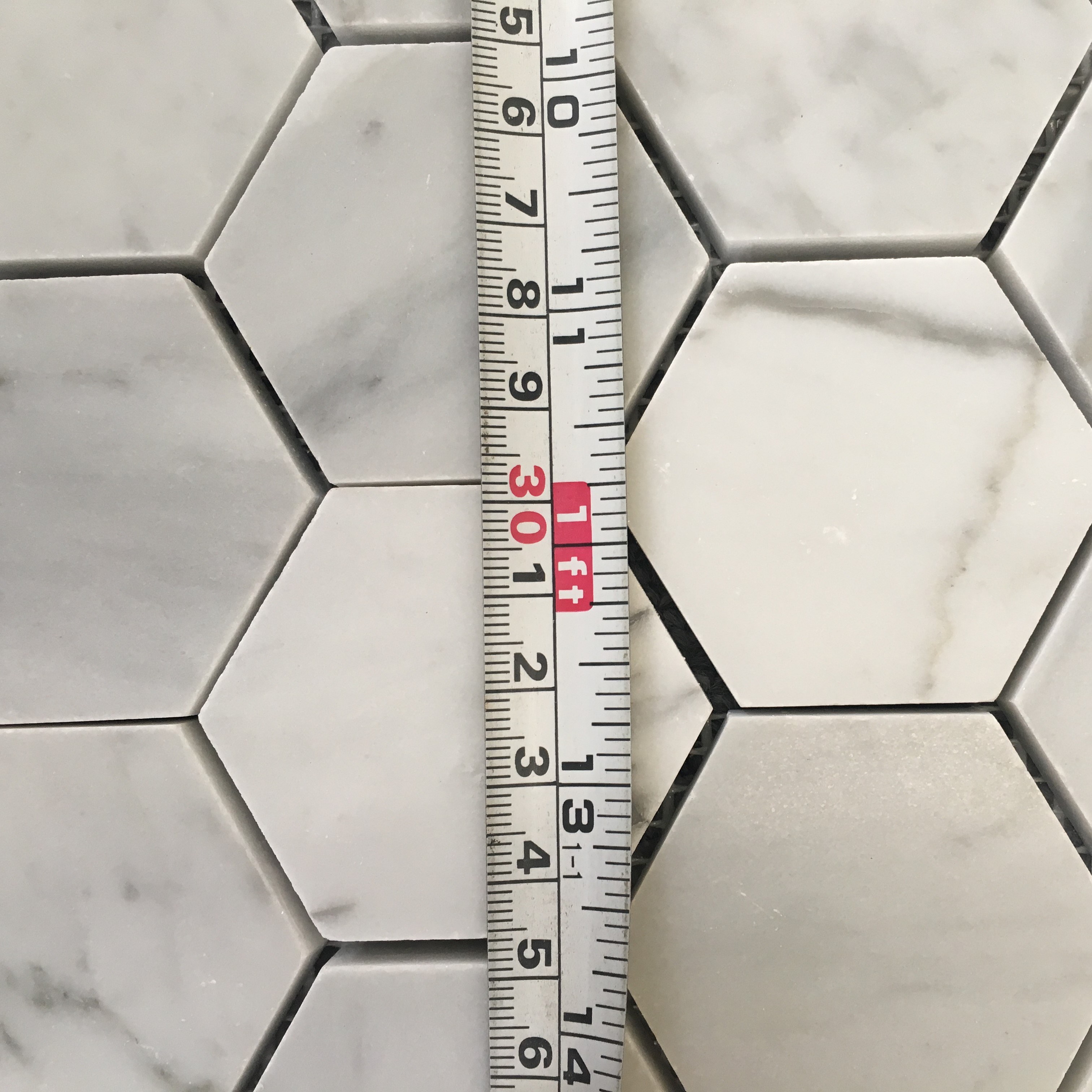 carrara herringbone mosaics
