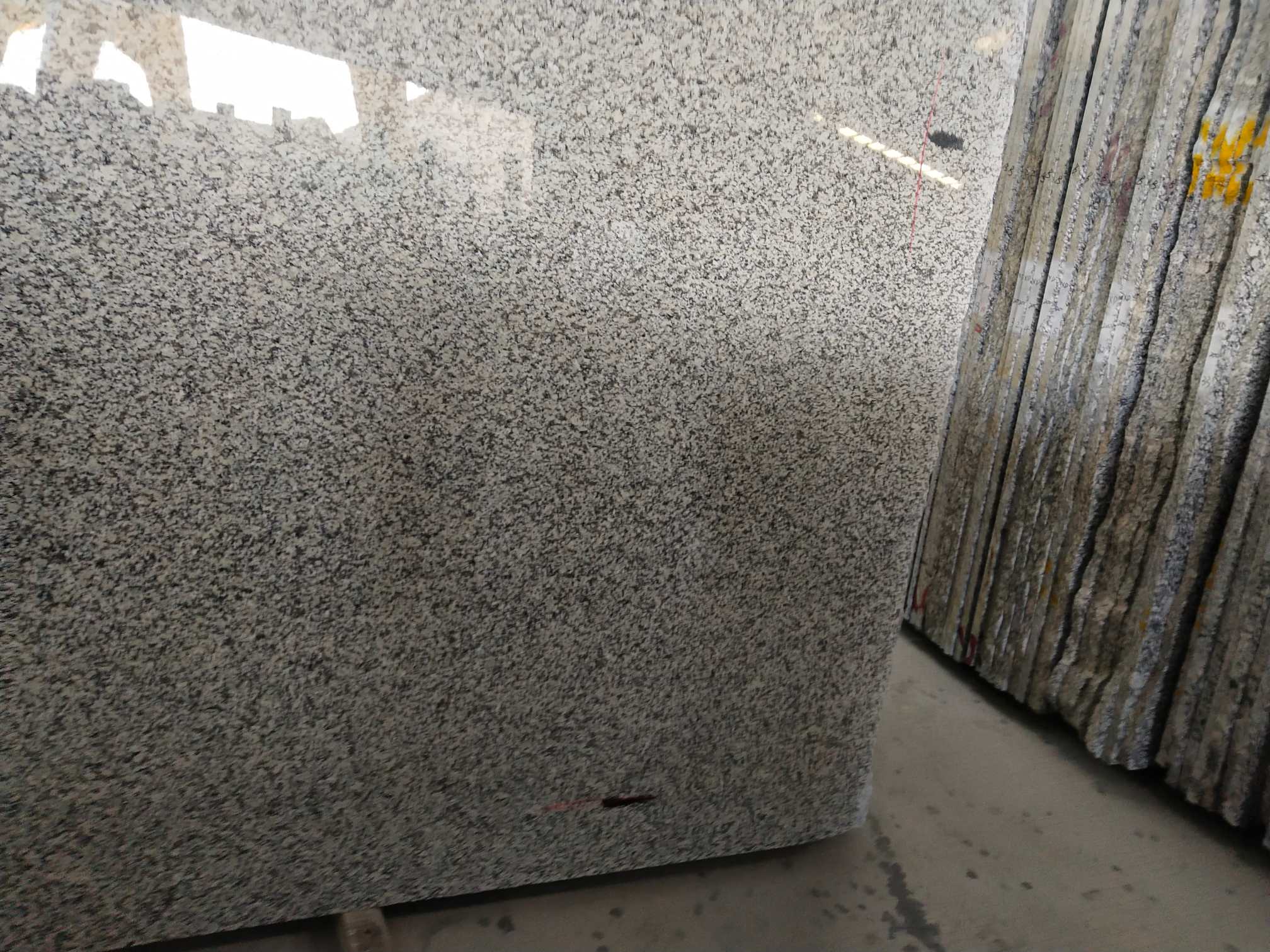Luna Pearl Granite also called Jilin White/Stellar White Granite, it can be most affordable granite countertops.
