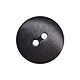 Corozo nut buttons, derived from the seeds of the tagua palm tree, are eco-friendly and stylish fasteners for garments.