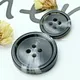 overcoat button