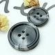 overcoat button