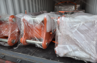 Excavator boom packing and export