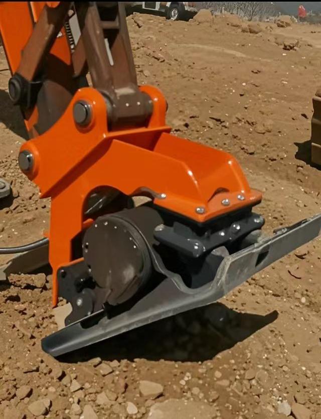 Hydraulic vibratory tamper