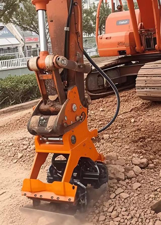 Hydraulic vibratory tamper