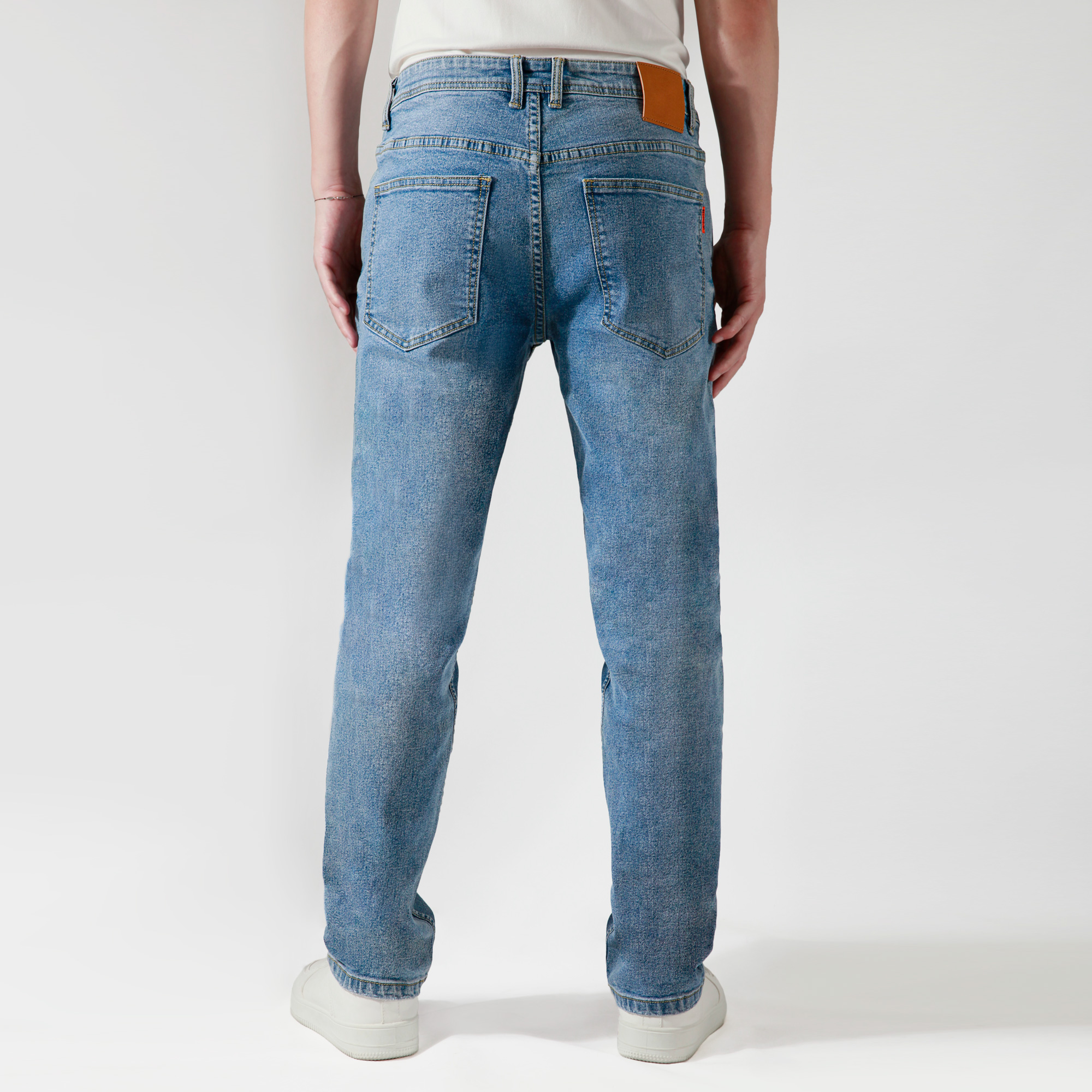brown tapered jeans