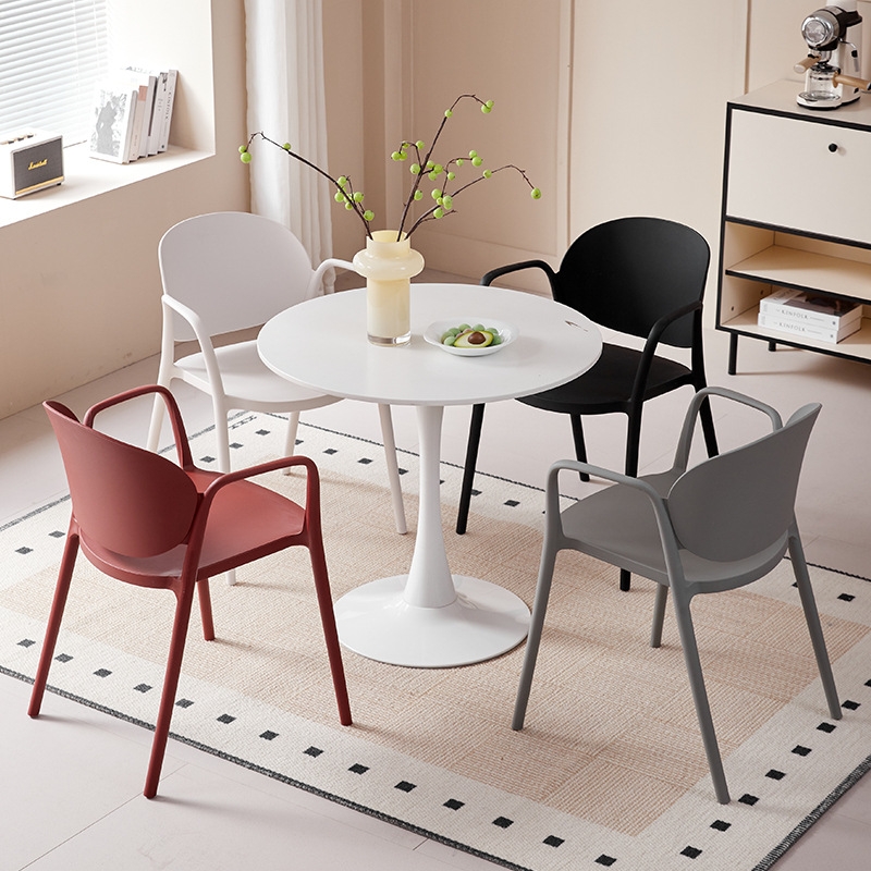 This simple plastic outdoor chair offers practical seating for various occasions