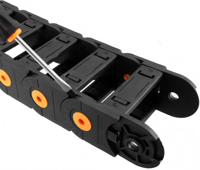 A 30x10 drag chain mounted on industrial equipment for organized cable management.