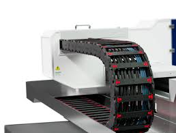 An industrial cable management solution guiding multiple cables safely along automated machinery.