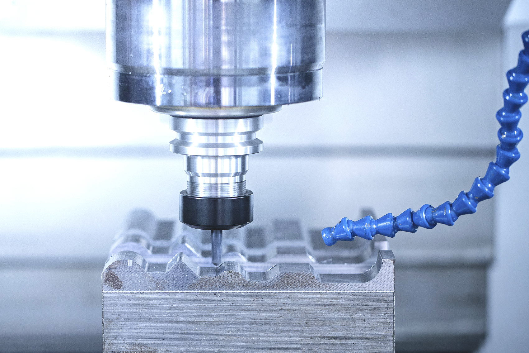 Learn the complete CNC machining process step by step, from engineering drawing and material selection to milling, finishing, and quality inspection. Understand how custom parts are made.