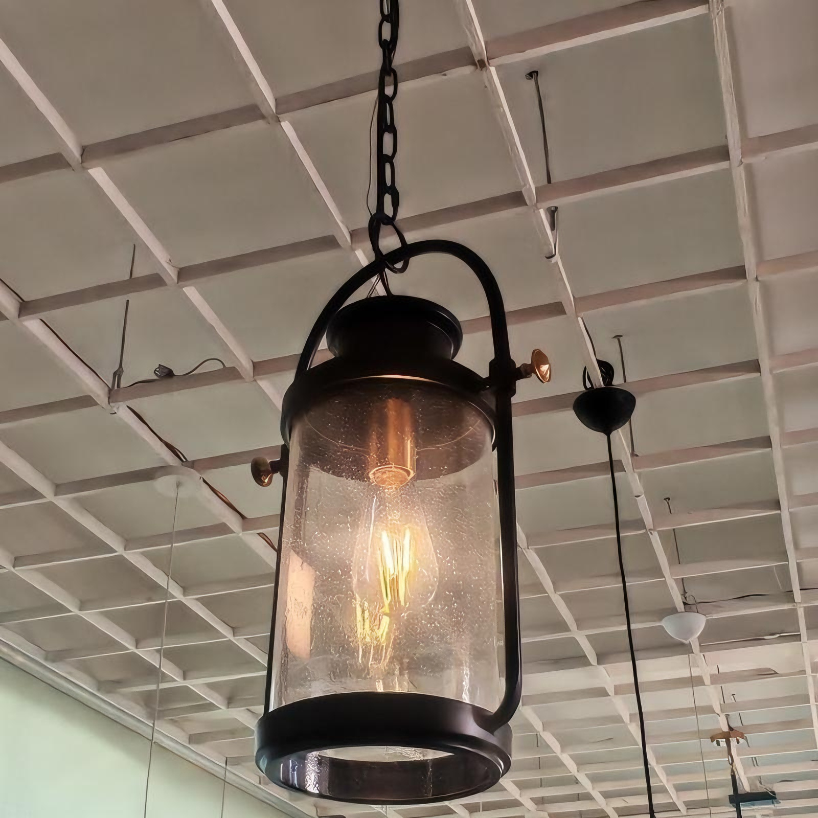 Black metal vintage chandelier, rustic style for cafe, bar, loft and industrial interiors.