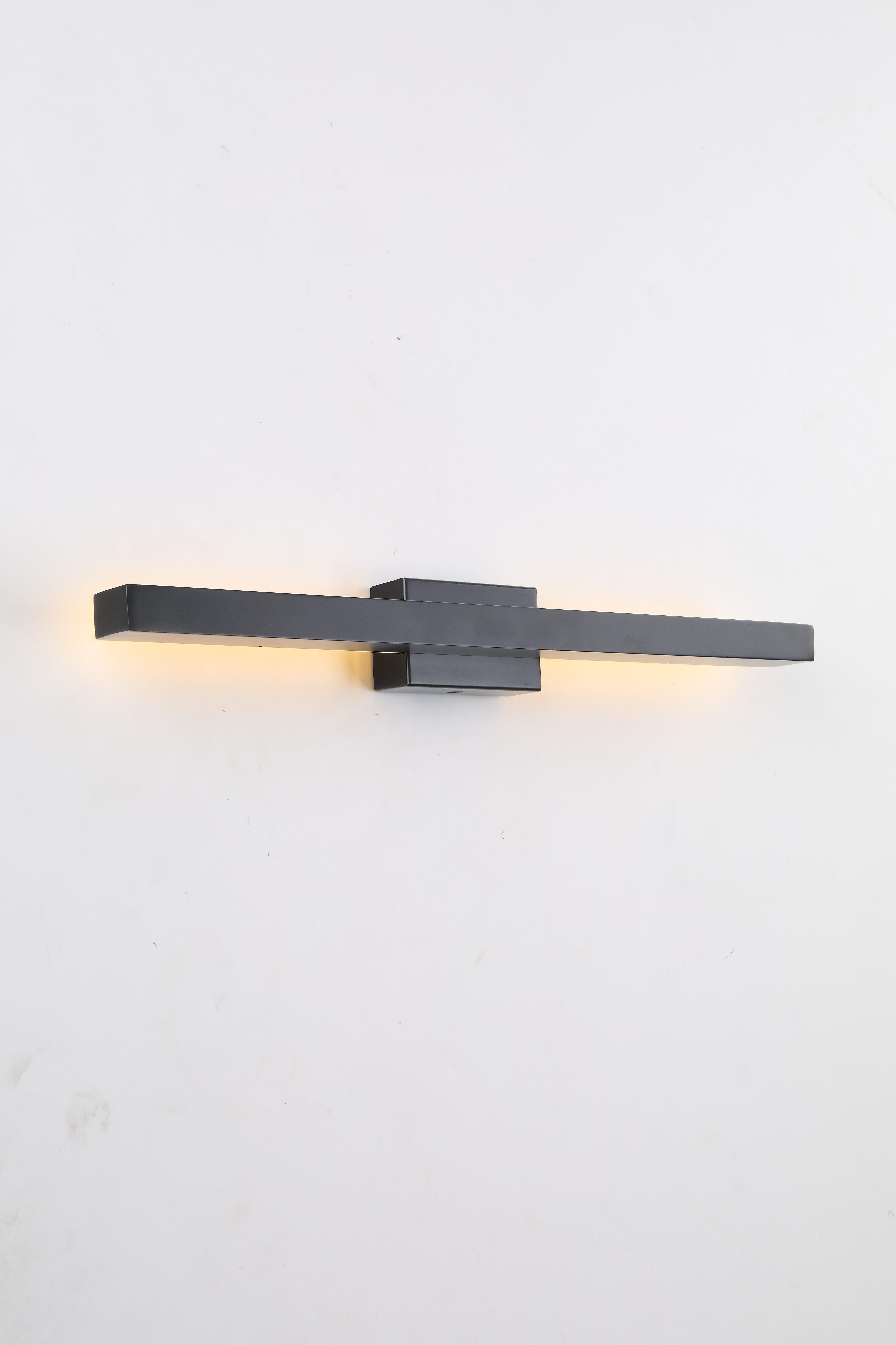 Modern minimalist wall light, sleek LED wall sconce for modern home bedroom decor
