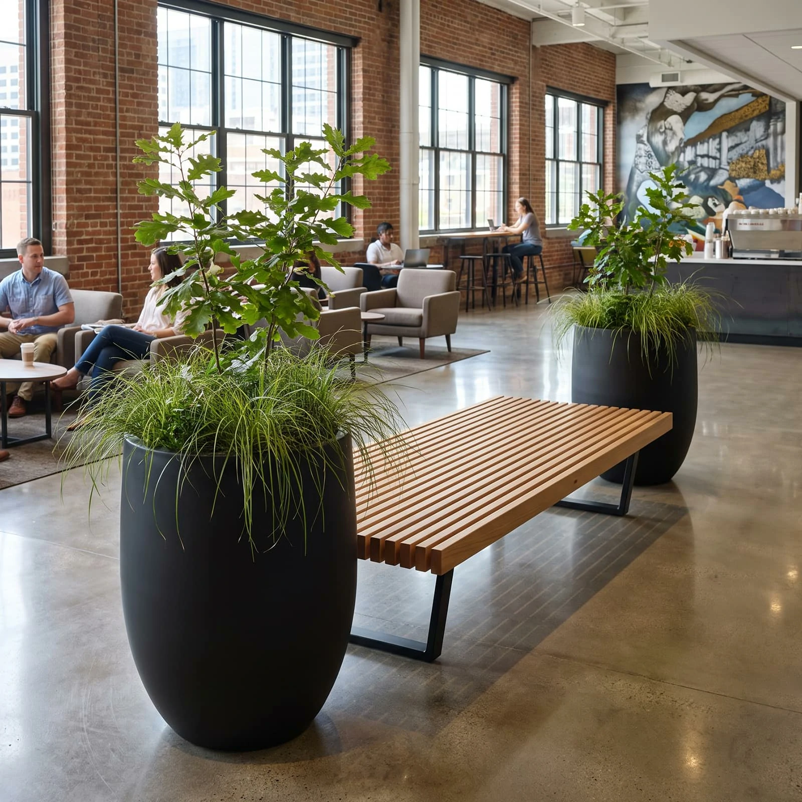 RC-1016EF oversized tall round GFRC planter used in a hospitality lounge