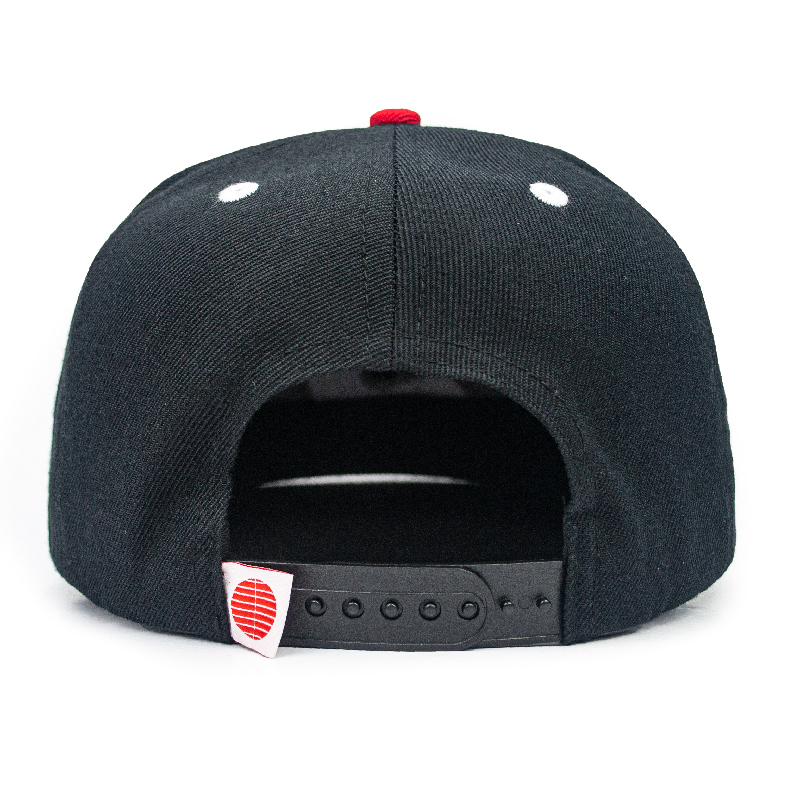 A Snapback cap is a trendy and widely - loved type of headwear. It is characterized by its structured crown, which gives it a firm and well - defined shape, maintaining its form even after long - term use.