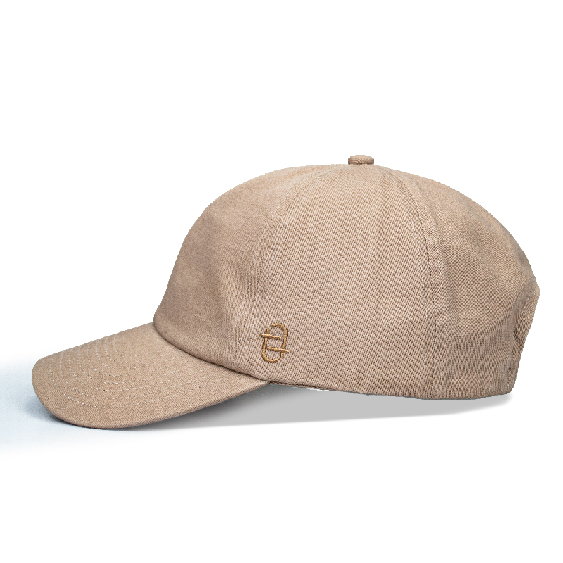 The cowboy hat, a symbol of the American West, features a wide brim for sun protection and a high crown for ventilation. Typically made of felt or straw, it’s durable and stylish, perfect for rugged outdoor adventures or fashion statements.