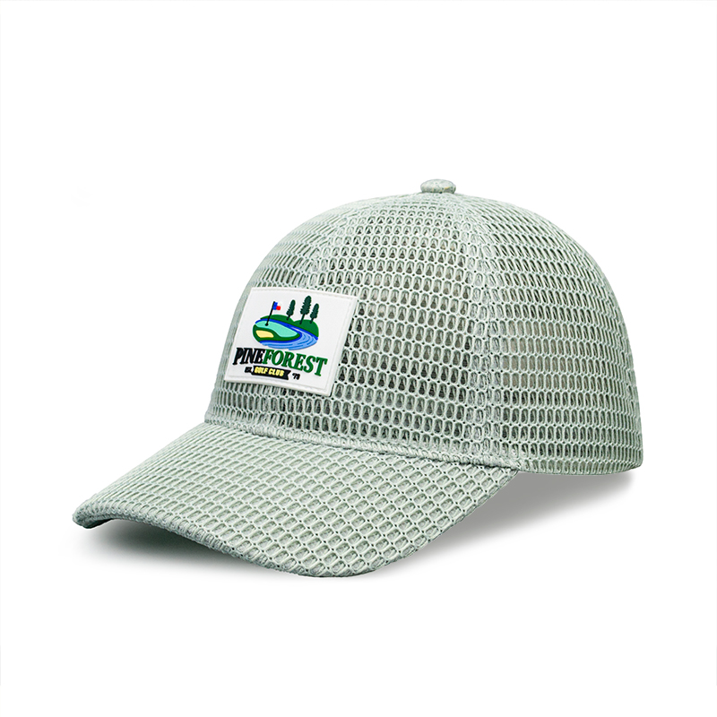 This cap is a stylish and functional accessory perfect for golf enthusiasts. Made with a breathable mesh fabric, it ensures excellent ventilation, keeping your head cool during outdoor activities. The front features a vibrant patch ，howcasing a picturesque golf course scene with a flag, trees, and a winding river, adding a touch of sporty charm. Its lightweight design and comfortable fit make it ideal for a day on the golf .