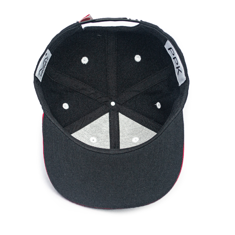 A Snapback cap is a trendy and widely - loved type of headwear. It is characterized by its structured crown, which gives it a firm and well - defined shape, maintaining its form even after long - term use.