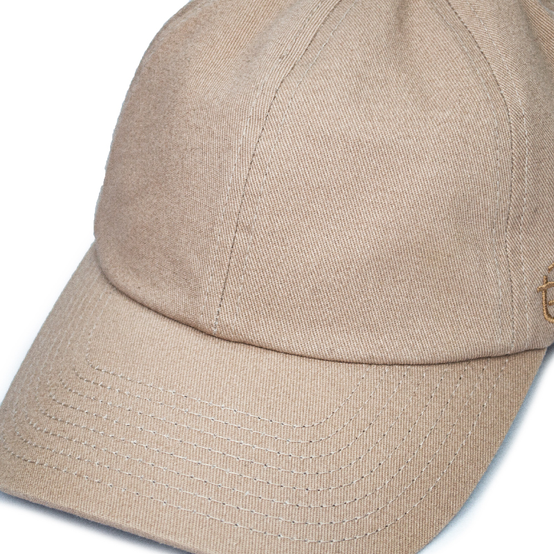 The cowboy hat, a symbol of the American West, features a wide brim for sun protection and a high crown for ventilation. Typically made of felt or straw, it’s durable and stylish, perfect for rugged outdoor adventures or fashion statements.
