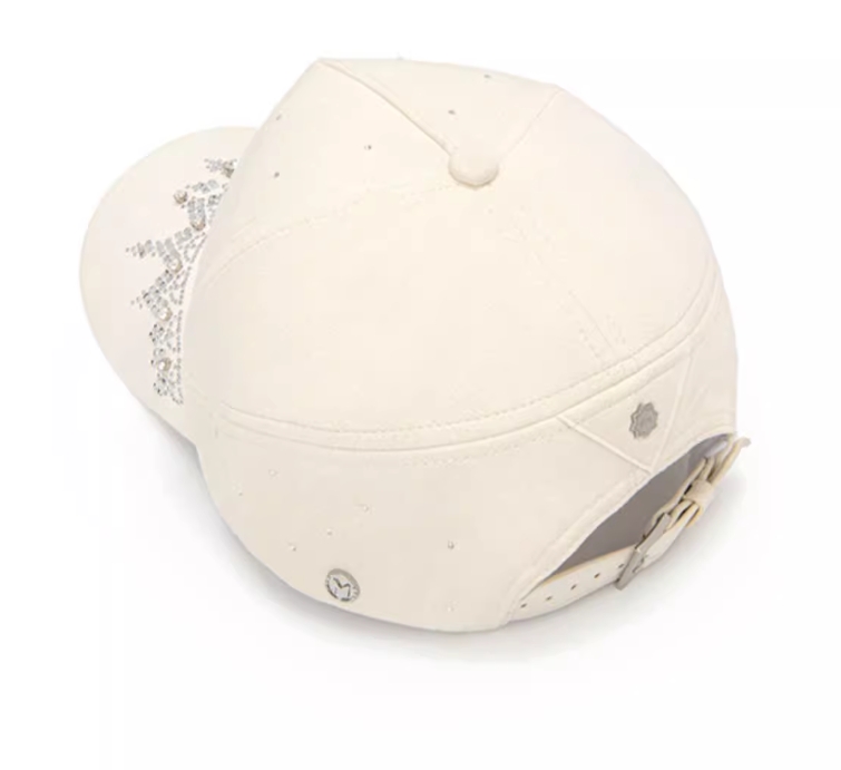 This is a very trendy custom embroidered cap.The forehead is covered with shiny artificial stone, exuding a strong sense of fashion.Fashion caps are not just about style; they also offer functionality. They can be adjusted to fit different head sizes, This ensures a comfortable and secure fit for everyone.