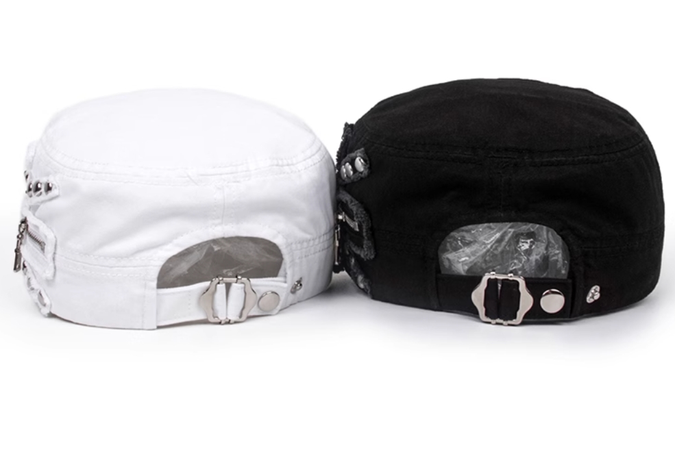 A bold fusion of edgy design and retro charm! These statement-making hats feature a sleek flat crown for a modern silhouette, accented with industrial rivet details and a zipper embellishmet for an urban, avant-garde twist.