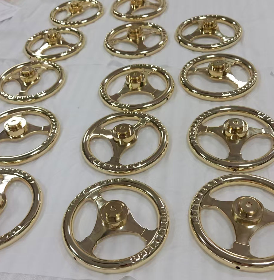 Radiant gold Ferrari steering wheels, showcasing our craftsmanship.