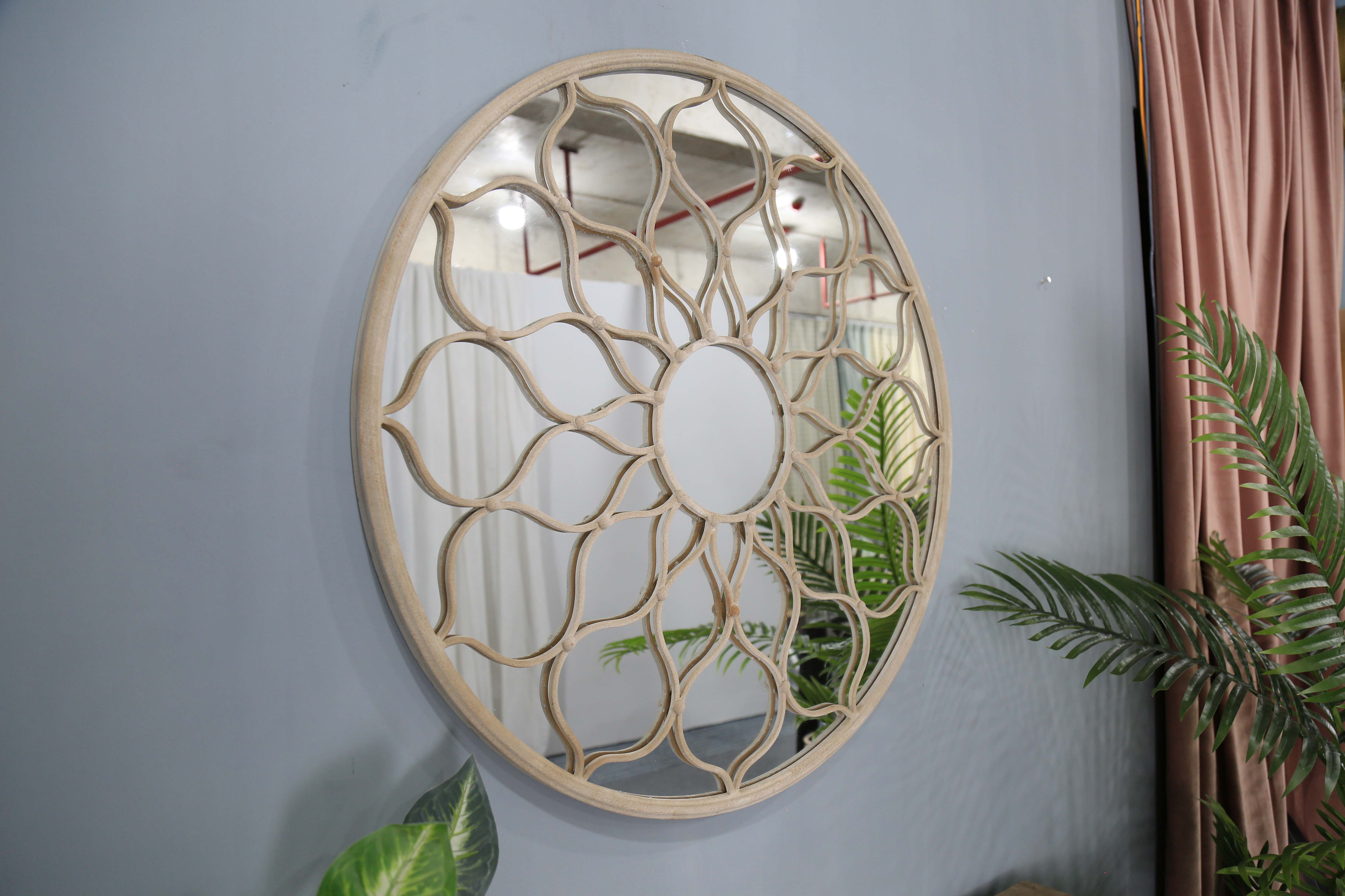 garden wall mirror on showroom wall