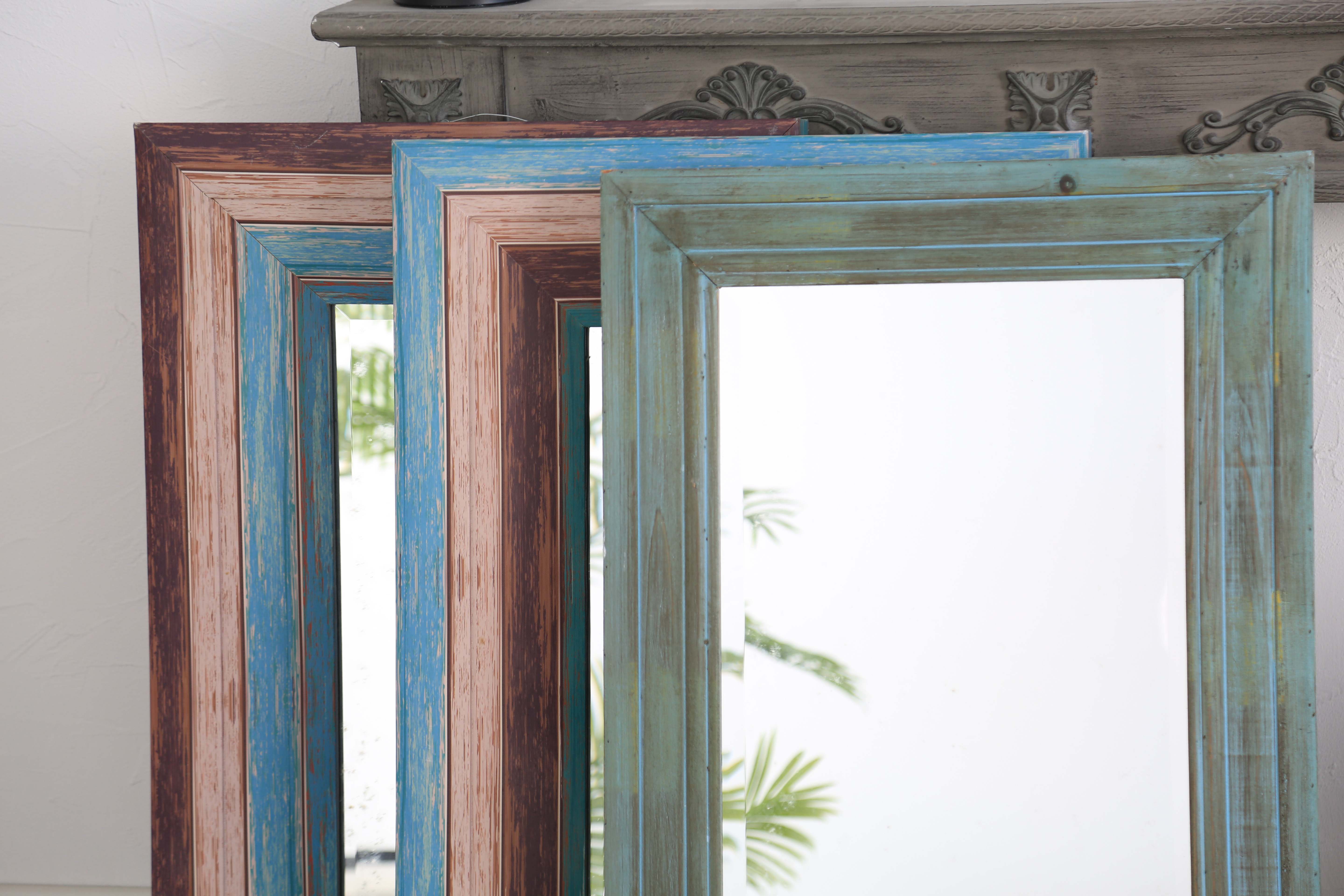 antique carved wood mirror with different colors