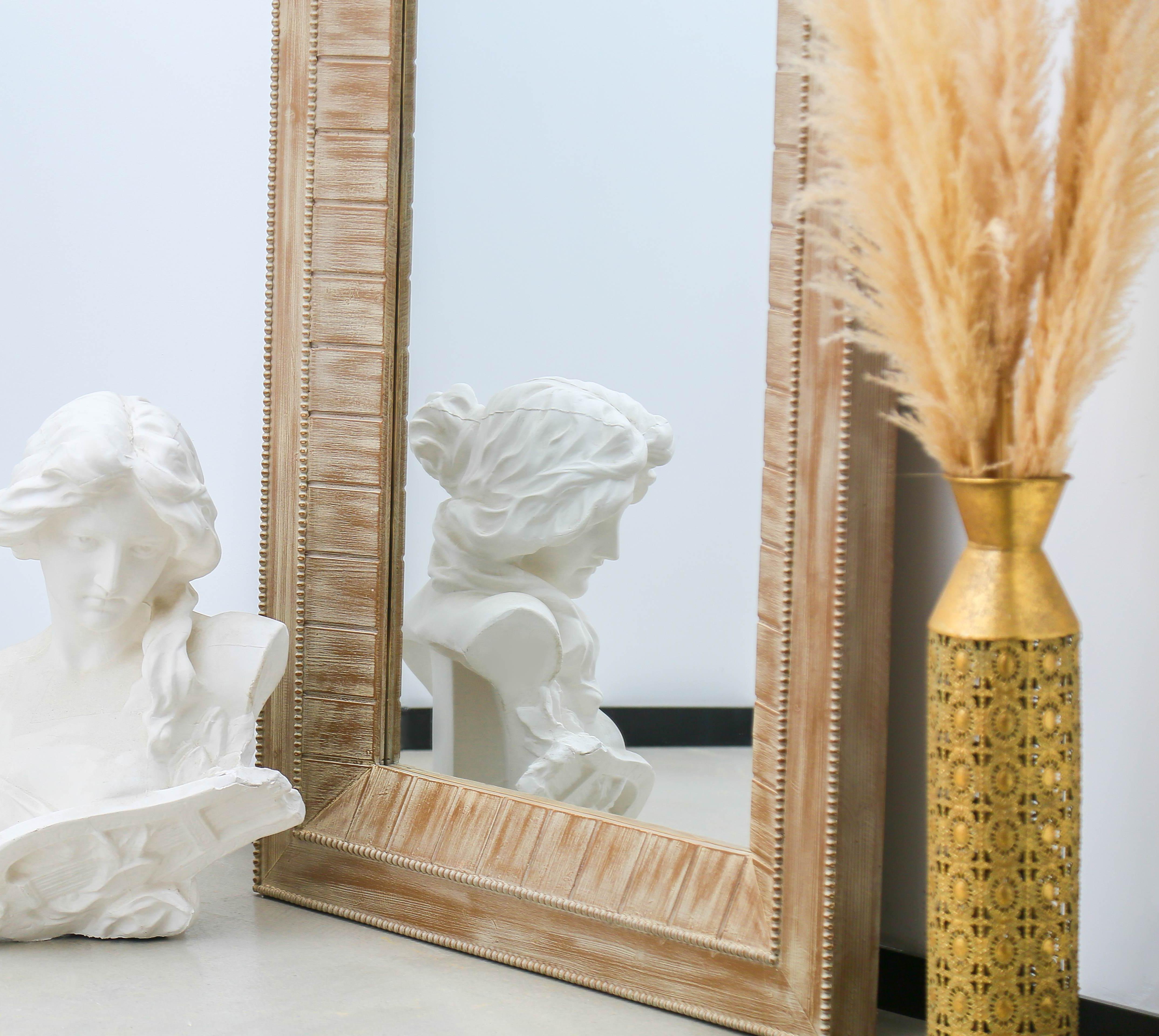 deco art mirror with ornate detail