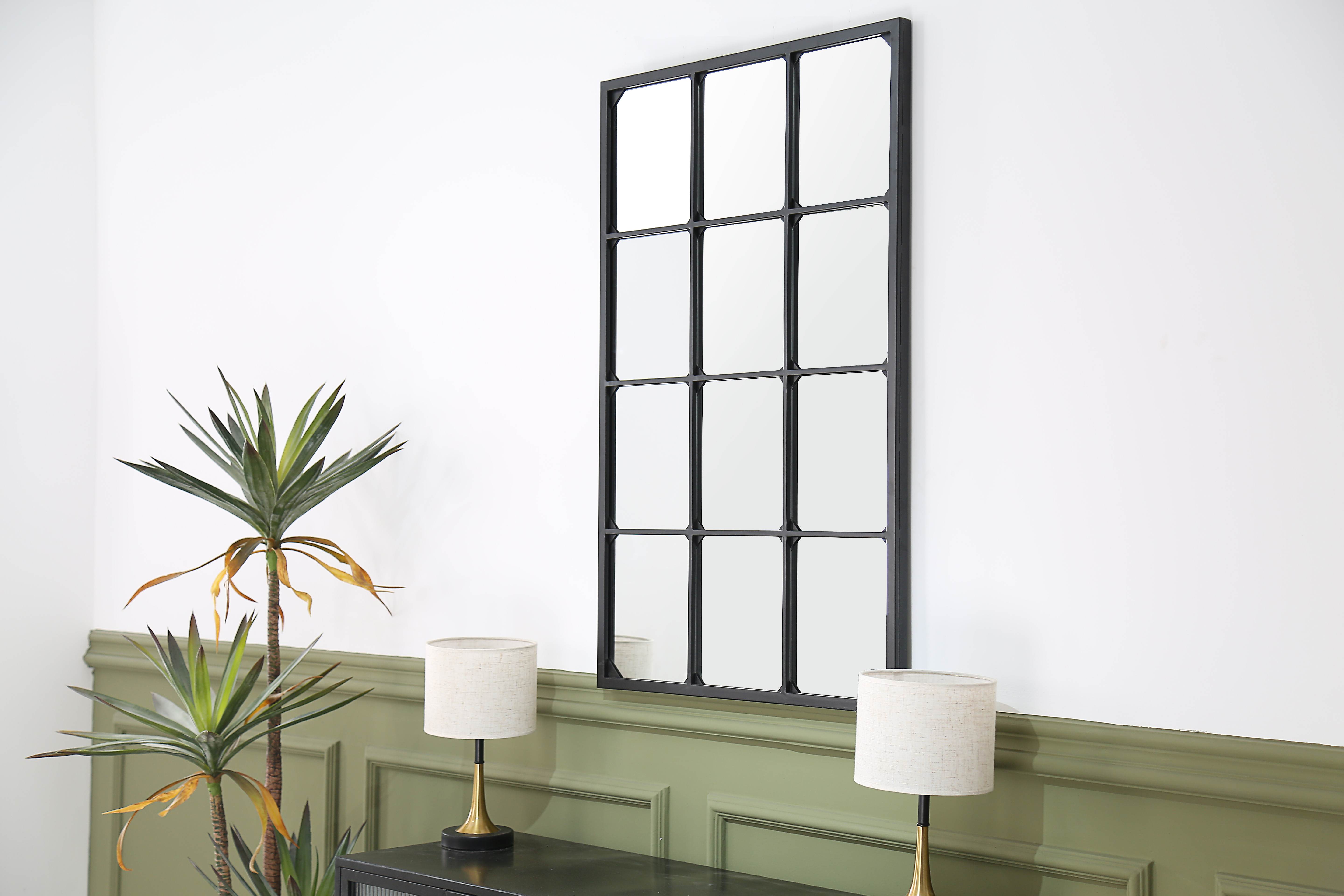 Modern Industrial Geometric Panelled Wall Mirror showcasing lush greenery in a vibrant entryway setting