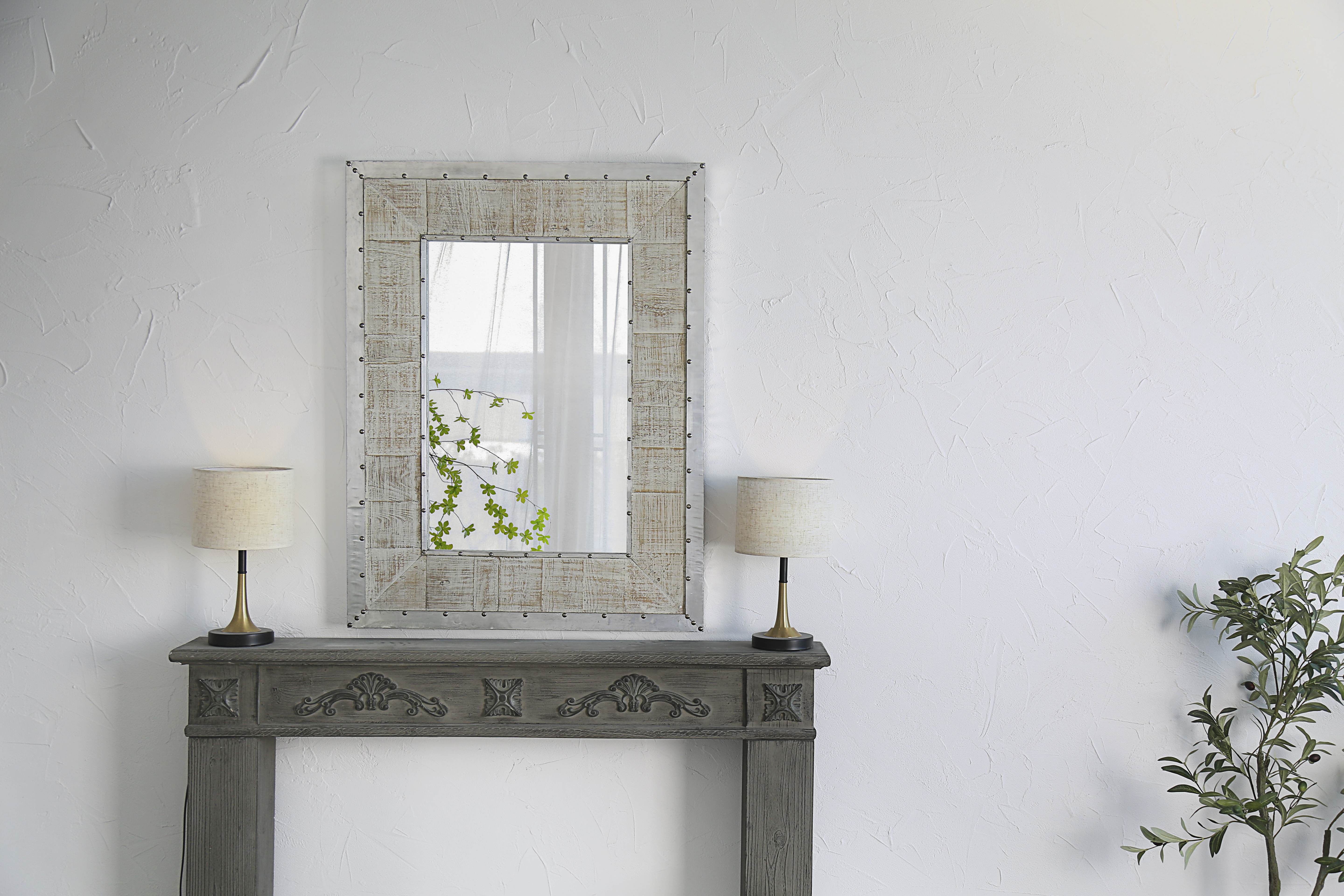 entryway mirror against the showroom wall