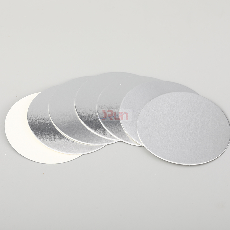 Our reliable induction liners are a key component for our clear plastic food boxes, providing a secure seal on every containers with lids for custom cookie packaging.