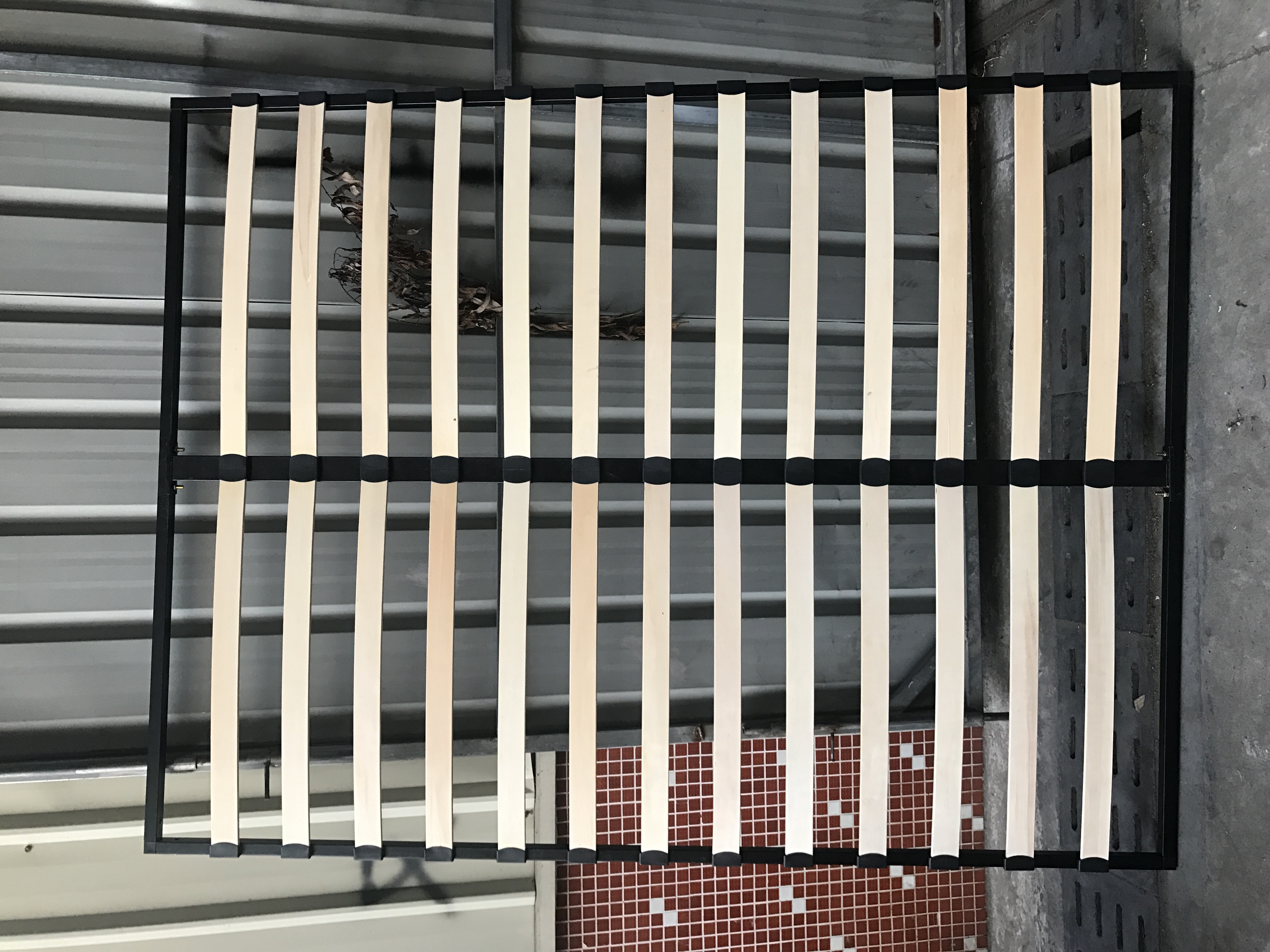metal bed frame with wooden slats