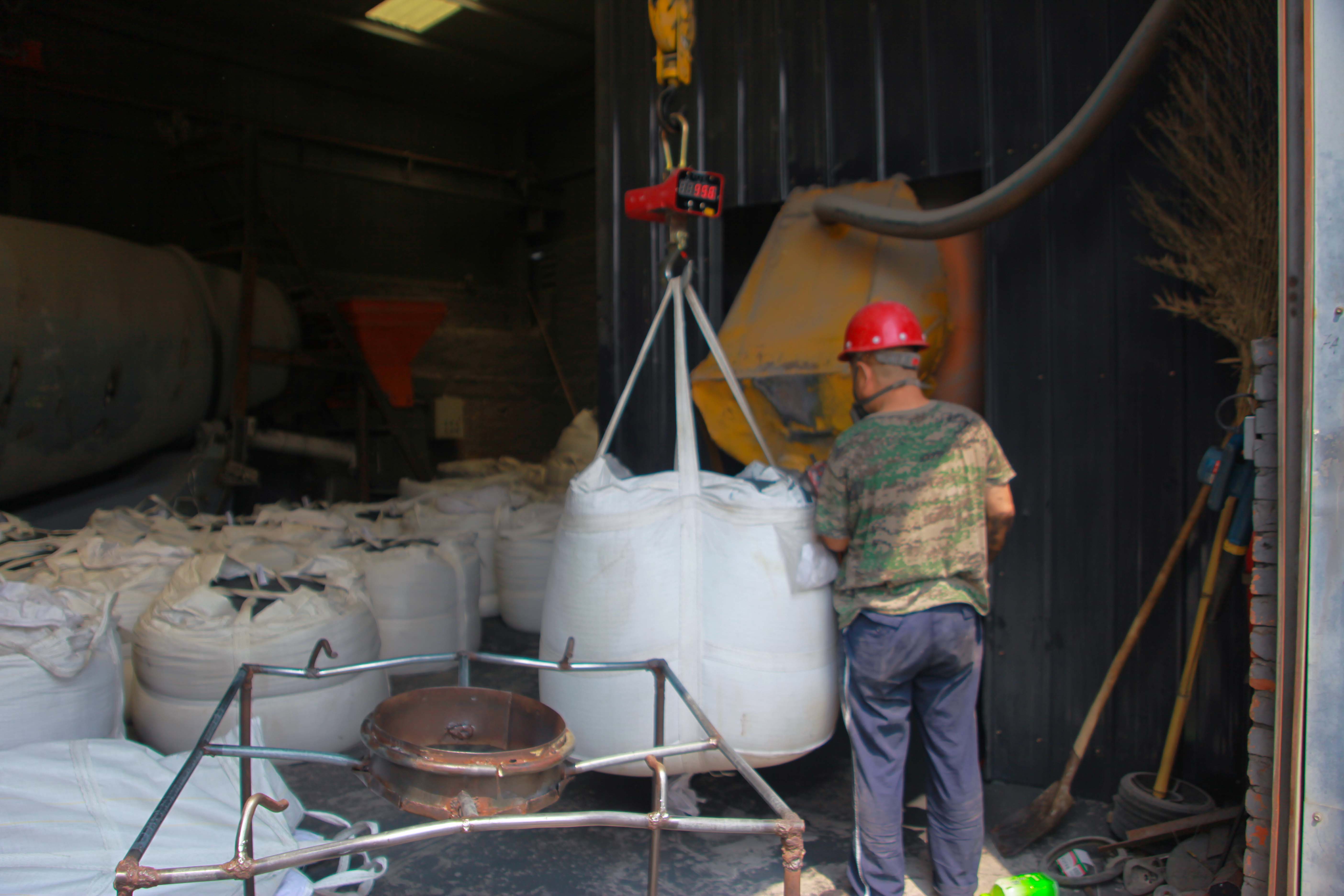 Workers are screening the finished products