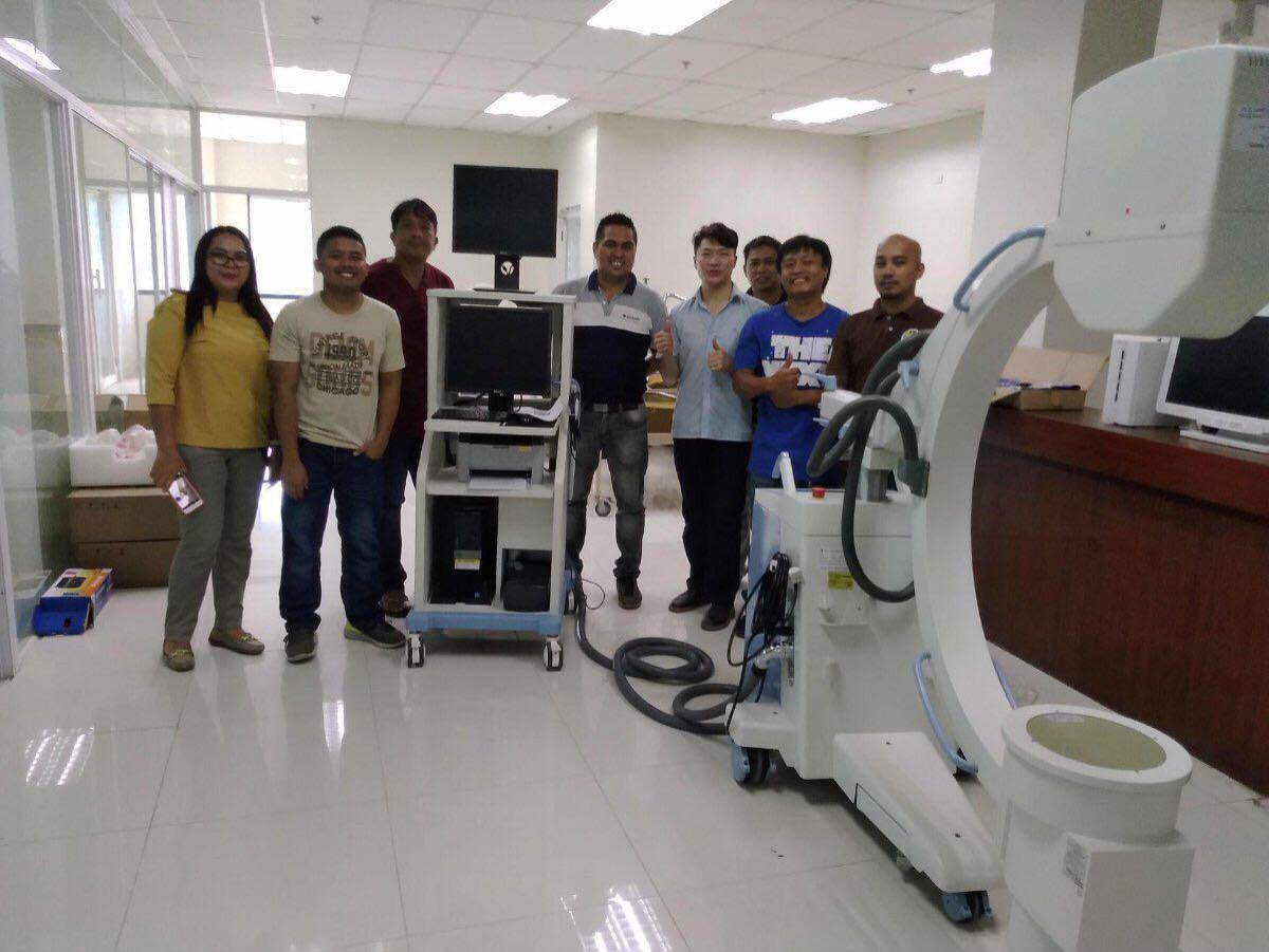 hospital team celebrating the installation.