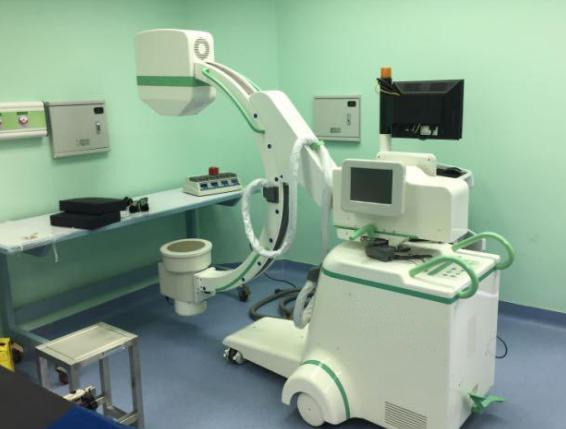 the c arm fluoroscopy machine in the operating room.