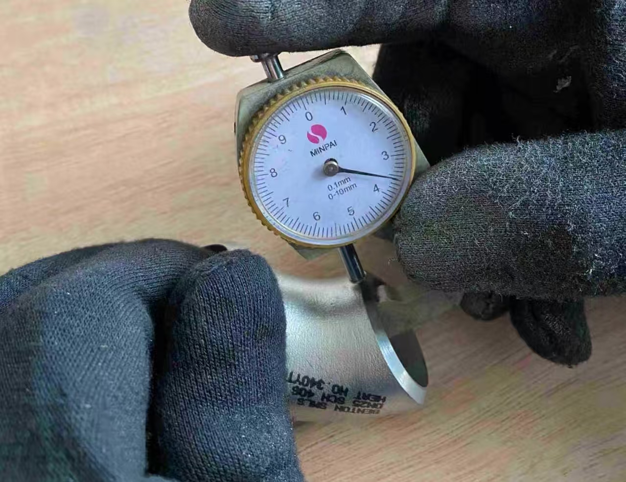 Measuring the thickness of ASTM A403 Pipe Fitting