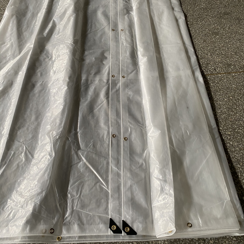 Clear Heavy Duty Tarp with Grommets – Close-Up of Copper Buckle Eyelet Detail