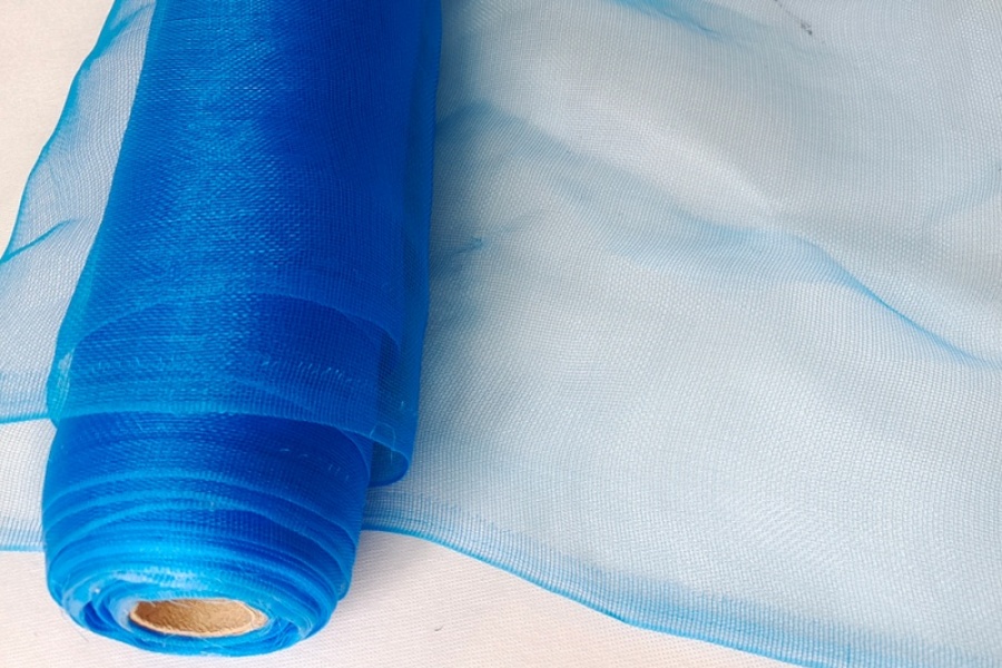 Heavy duty windbreak netting – Close-Up of Rolled Blue Insect Net