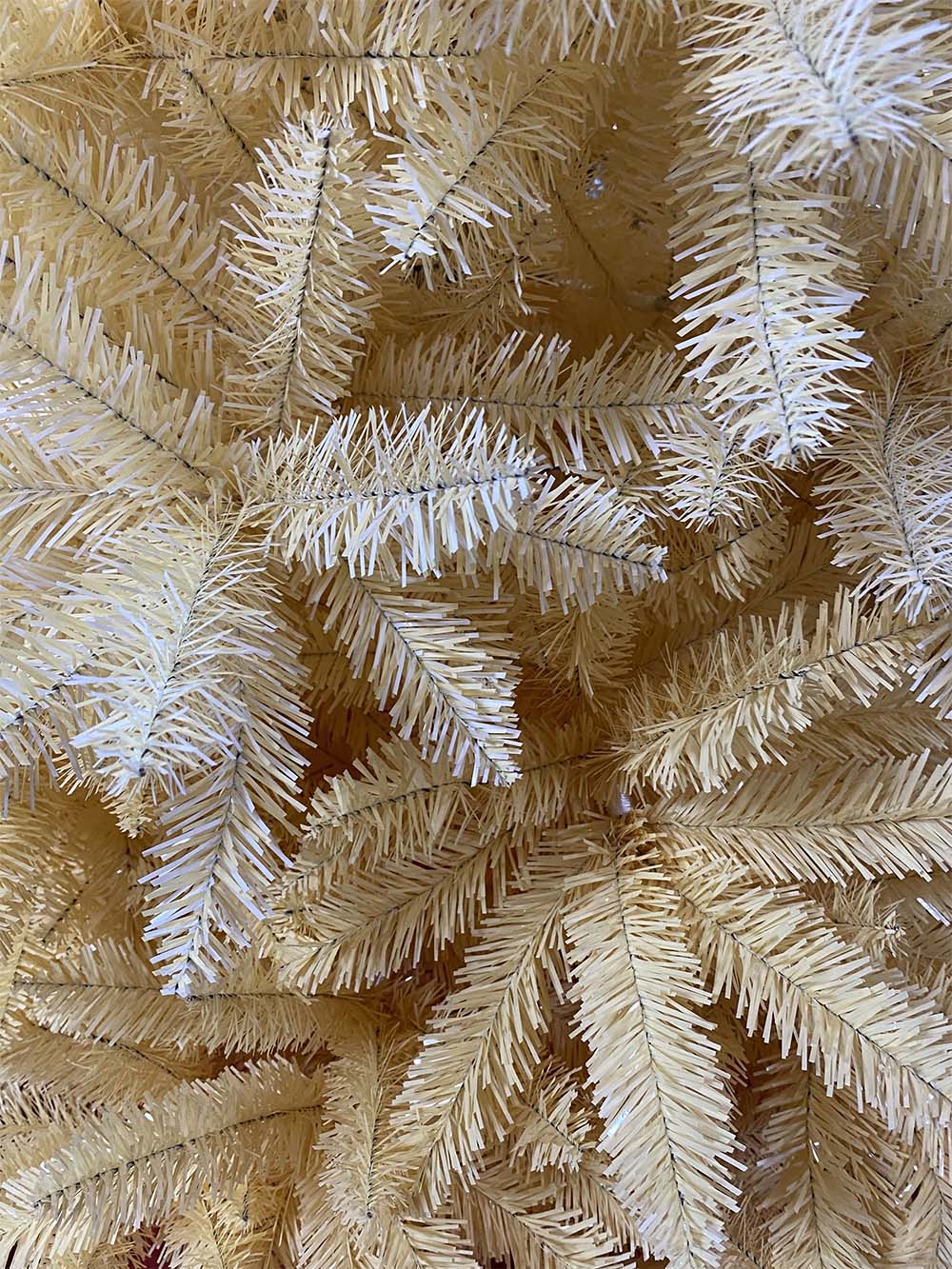 Elevate your holiday decor with the Trendy Tree Ombre Gold-White Artificial Christmas Tree. This full-bodied tree features a gradient gold-to-white finish, lush PVC needles, and a sturdy metal stand. Perfect for home, office, and Christmas party displays.