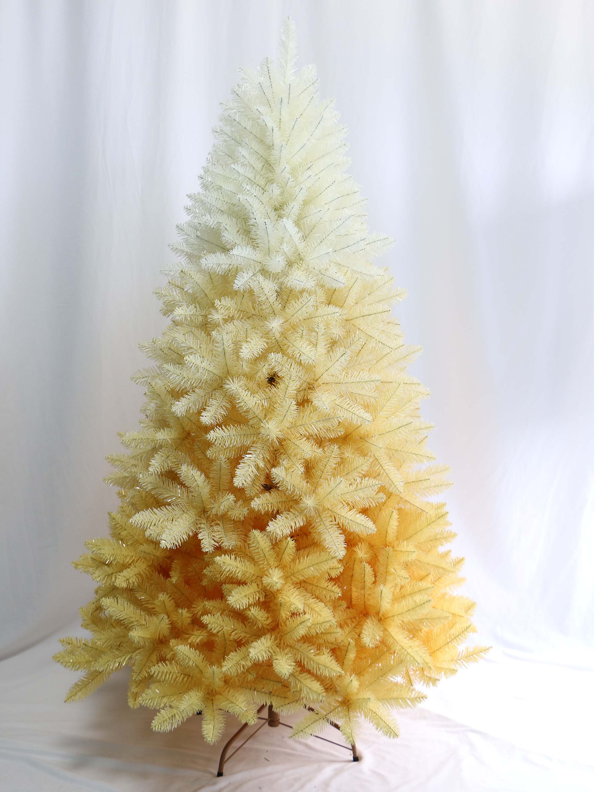 Elevate your holiday decor with the Trendy Tree Ombre Gold-White Artificial Christmas Tree. This full-bodied tree features a gradient gold-to-white finish, lush PVC needles, and a sturdy metal stand. Perfect for home, office, and Christmas party displays.
