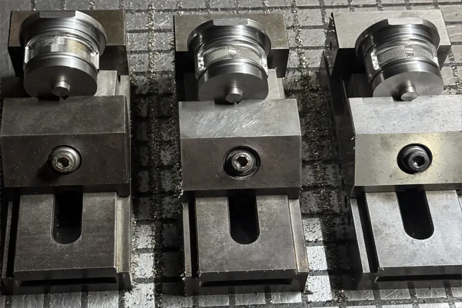 Stable workpiece fixturing during precision CNC machining