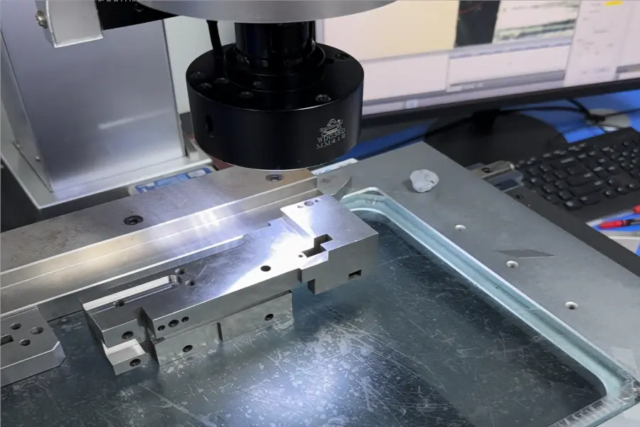 Dimensional inspection of a tight tolerance CNC machined part