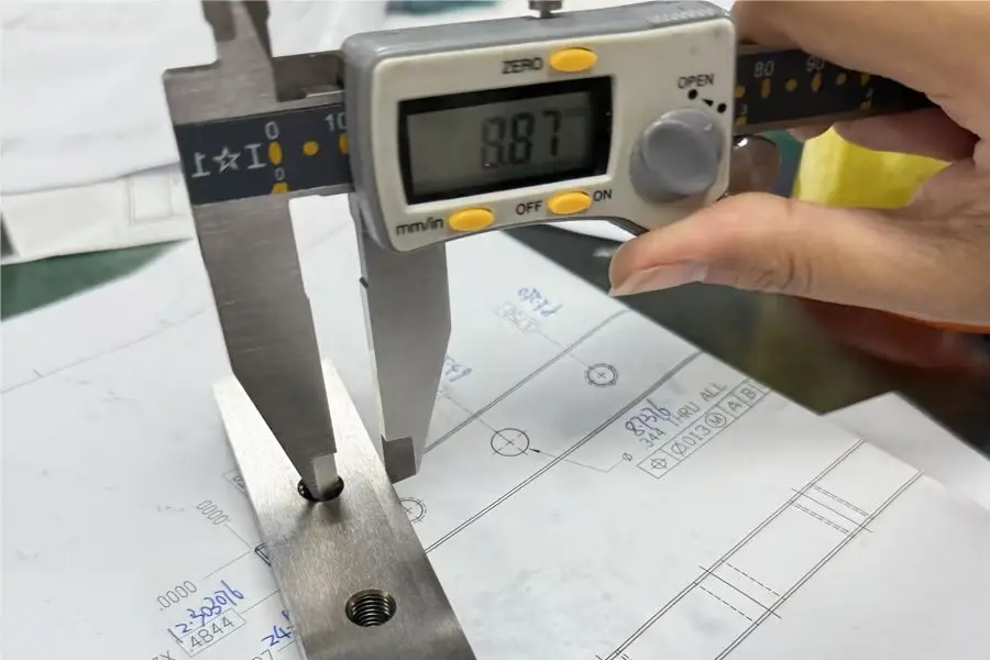 Dimensional inspection and quality record review for precision machined parts