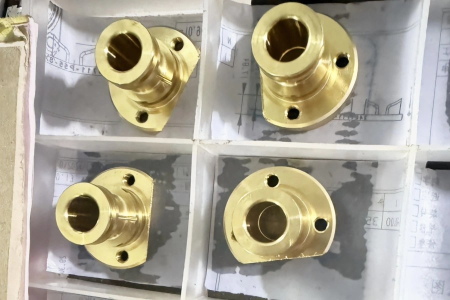 Precision Machined Brass Components Precision machined brass components with central bores and mounting holes