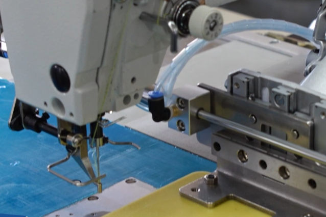 DT 2210G-01A/CH Computerized pattern tacker machine with sliding presser foot